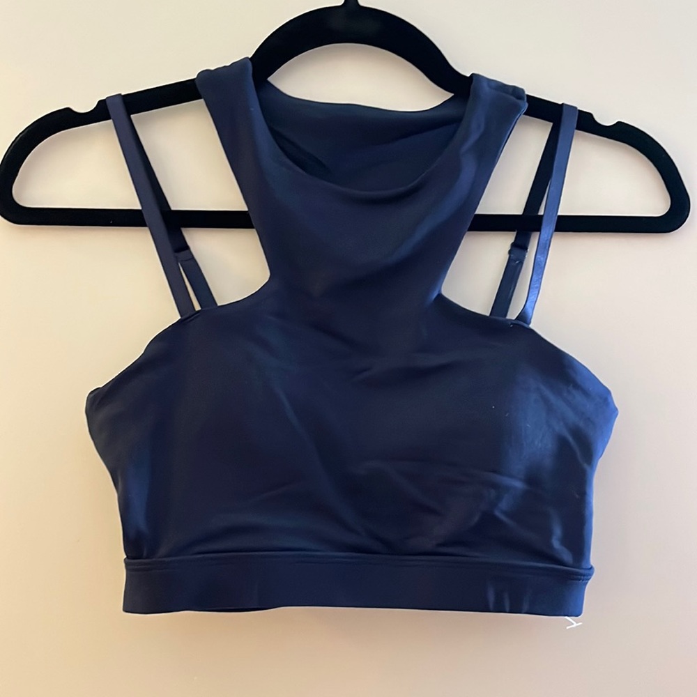 Racerback Sports Bra with straps. Back has a cut out detail. Deep Navy Blue